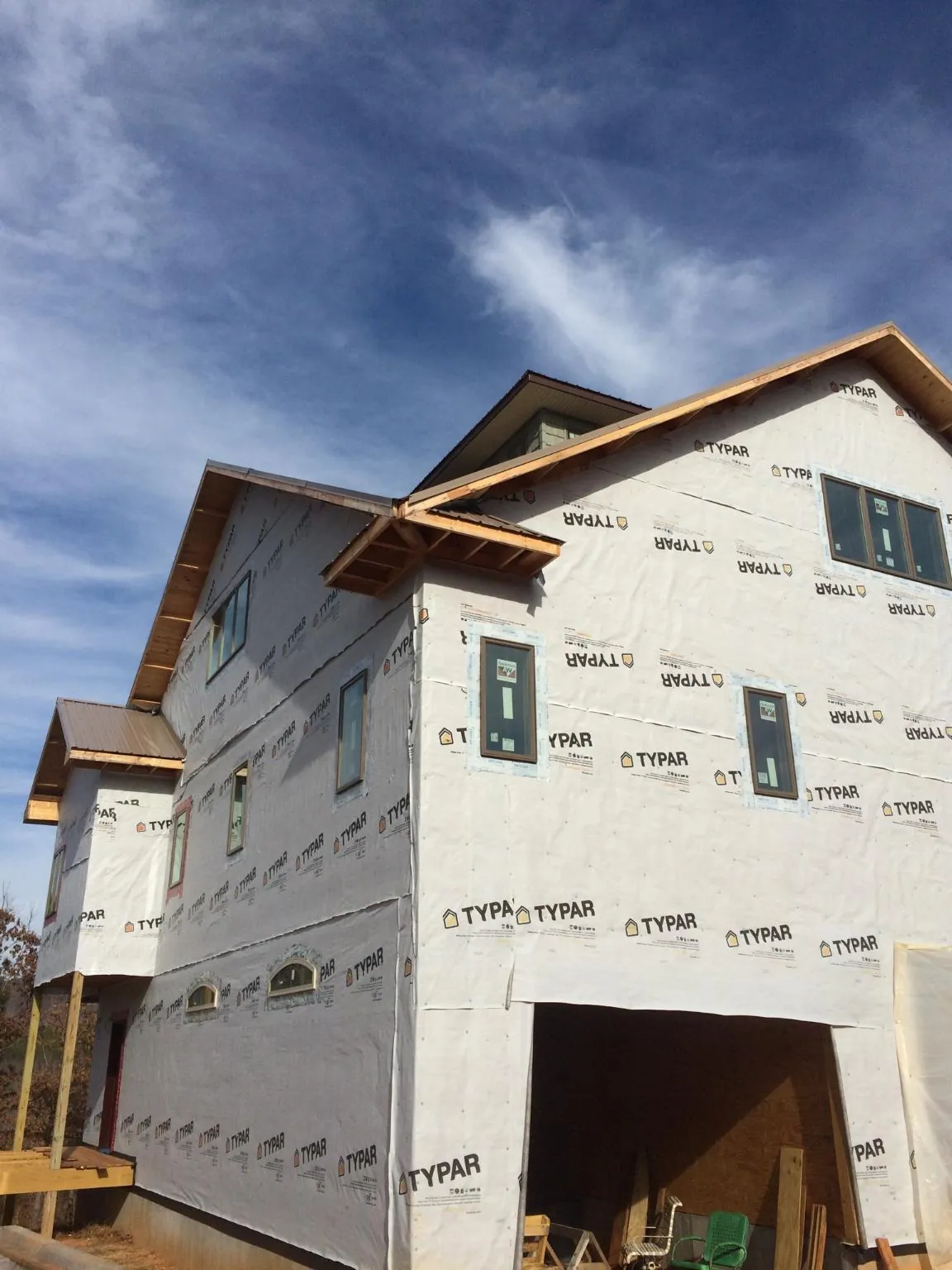 Stick built house wrapped in Typar with new roof framing and dormers in West Jefferson